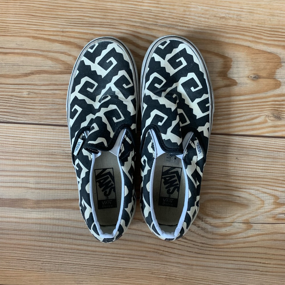 Patterned black and white vans